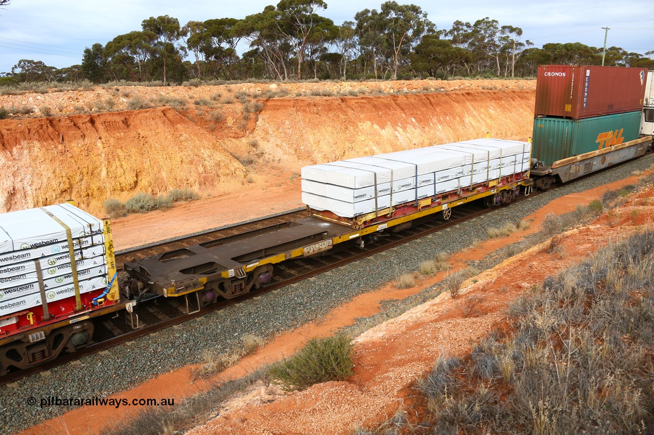160524 3818
West Kalgoorlie, 2PM6 intermodal train, RQSY 34979 container flat waggon originally built by Goninan NSW in a batch of one hundred OCY type in 1975, recoded to NQOY, the modified to NQSY. Loaded with a K&S 40' flatrack KHS 400635 with Wesbeam timber products.
Keywords: RQSY-type;RQSY34979;Goninan-NSW;OCY-type;NQOY-type;NQSY-type;