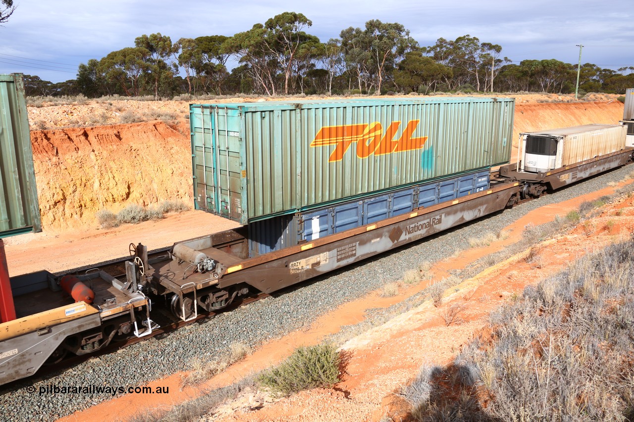 160524 3824
West Kalgoorlie, 2PM6 intermodal train, RRZY type five unit bar coupled well container waggon set RRZY 7028 platform 1, originally built by Goninan in a batch of twenty six as RQZY type for National Rail, recoded when repaired. Loaded with an SCF 40' half height side door container SCFU 607079 [5] double stacked with Toll 53' car container AB 031.
Keywords: RRZY-type;RRZY7028;Goninan-NSW;RQZY7-type;