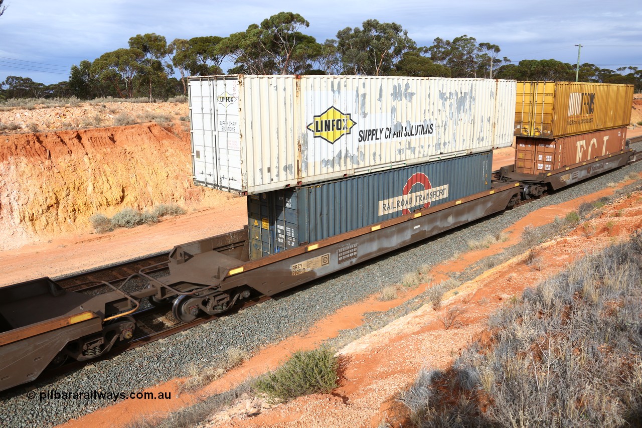 160524 3827
West Kalgoorlie, 2PM6 intermodal train, RRZY type five unit bar coupled well container waggon set RRZY 7028 platform 4, originally built by Goninan in a batch of twenty six as RQZY type for National Rail, recoded when repaired. Loaded with a Railroad Transport 40 4EG1 type container RTPU 4021 double stacked with Linfox 53' car container DRC 371.
Keywords: RRZY-type;RRZY7028;Goninan-NSW;RQZY7-type;