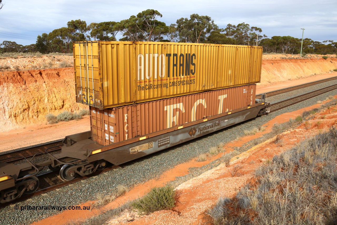 160524 3828
West Kalgoorlie, 2PM6 intermodal train, RRZY type five unit bar coupled well container waggon set RRZY 7028 platform 5, originally built by Goninan in a batch of twenty six as RQZY type for National Rail, recoded when repaired. Loaded with a 48' FCL container FBGU 480327 [5] double stacked with Autotrans 53' car container AB 036.
Keywords: RRZY-type;RRZY7028;Goninan-NSW;RQZY7-type;