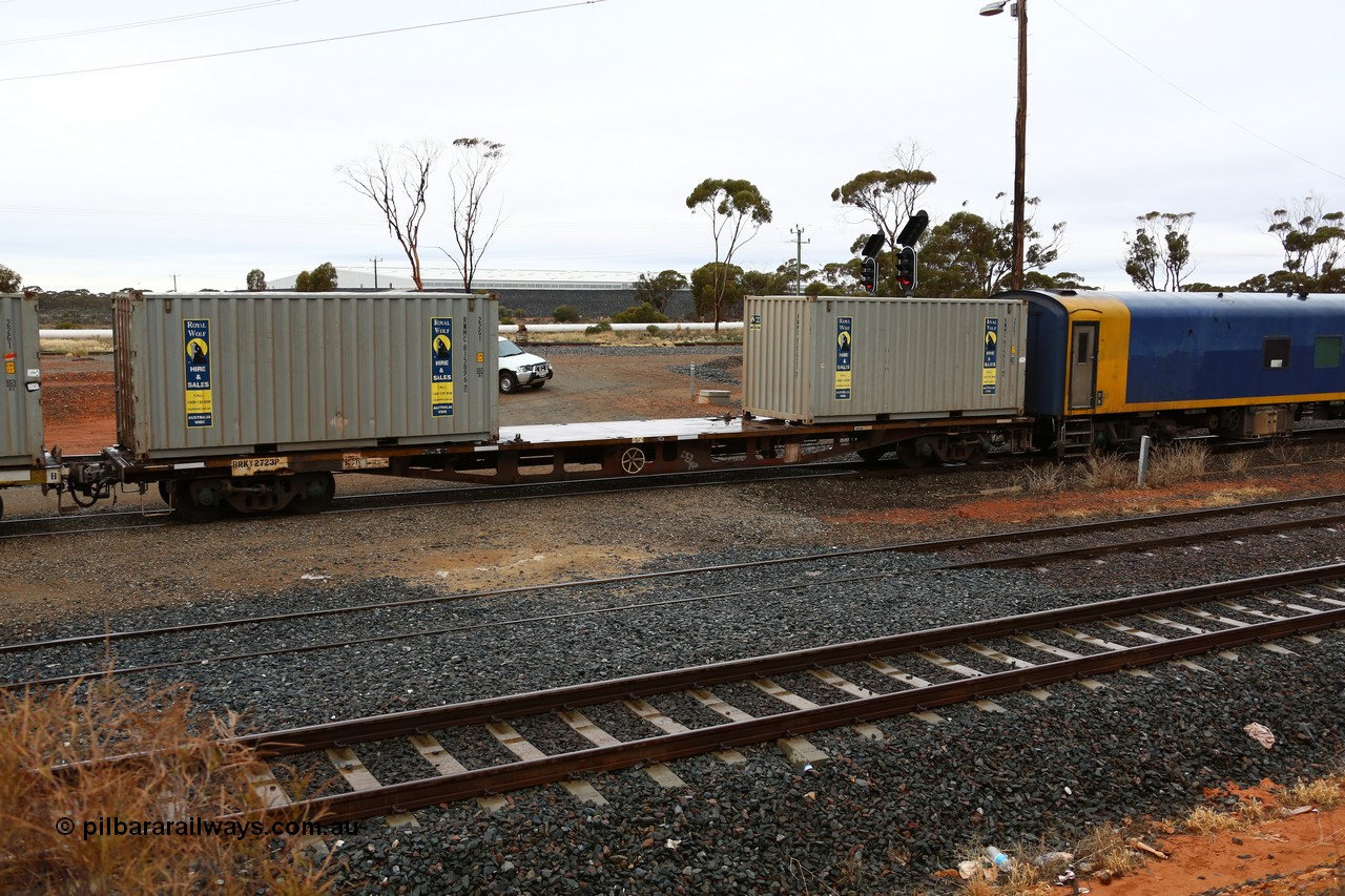 160524 4243
West Kalgoorlie, 1MP2 steel train, RRKY 2723, originally built by Perry Engineering SA in 1974 part of a batch of forty five RM type motor vehicle flat waggons, recoded to AQPY container waggon, then AQMP and RQKY, riding on aligned bogies, loaded with two Royal Wolf 20' 22G1 type boxes RWMC 815896 and 815921.
Keywords: RRKY-type;RRKY2723;Perry-Engineering-SA;RM-type;AQPY-type;AQMP-type;RQKY-type;