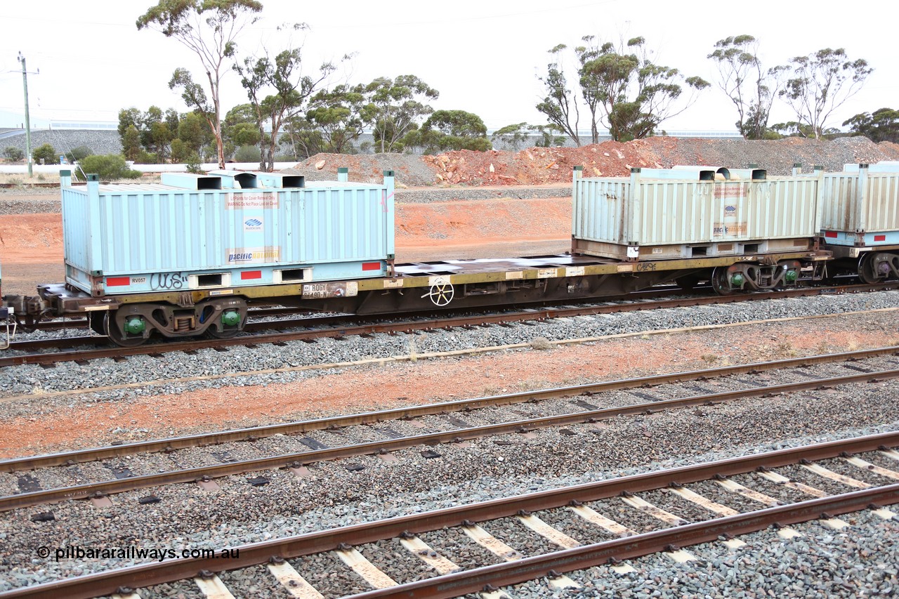 160524 4297
West Kalgoorlie, 1MP2 steel train, RQGY 34490 originally built by Tulloch Ltd NSW as part of a batch of one hundred OCY type 19.20 metre container waggons, recoded to NQOY and NQGY, seen here loaded with two RV type coil or 'butter box' containers RV 057 and RV 007.
Keywords: RQGY-type;RQGY34490;Tulloch-Ltd-NSW;OCY-type;NQOY-type;NQGY-type;