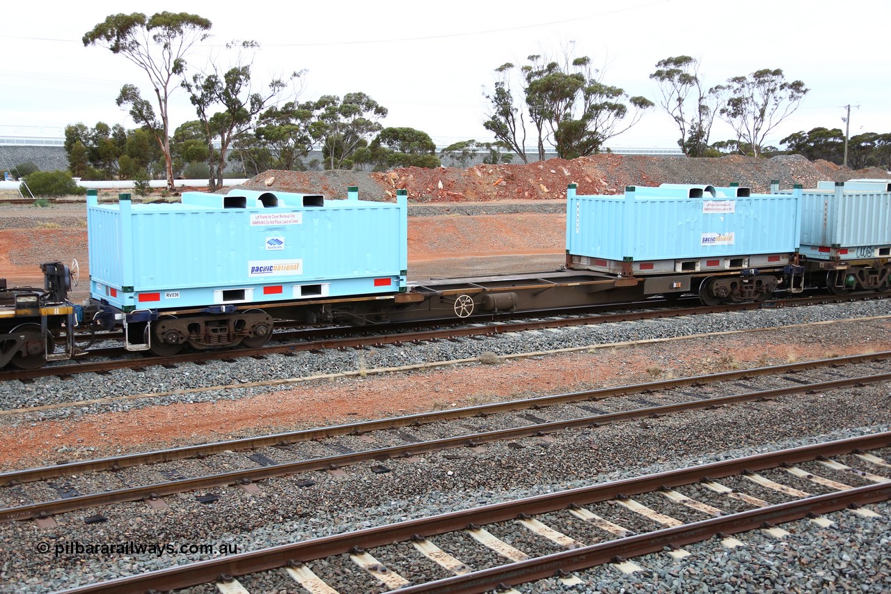 160524 4298
West Kalgoorlie, 1MP2 steel train, RQHY 7014 built new for Pacific National 2005-05 by Qiqihar Rollingstock Works China in a batch of seventy eight units 19.40 metre container waggons. Loaded with two RV type coil steel carrying containers or 'butter boxes' RV 036 and RV 035.
Keywords: RQHY-type;RQHY7014;Qiqihar-Rollingstock-Works-China;