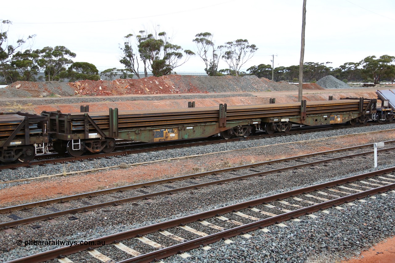 160524 4304
West Kalgoorlie, 1MP2 steel train, RKAX 6, 2-pack rail transport waggon, this waggon was converted by Port Augusta Workshops from two original FBX type waggons built in 1968-69 by Islington Workshops in a batch of twenty later coded AFCX. AKAX 6 and AKCX 14 where the donors for this waggon. Loaded with a full load of rail strings.
Keywords: RKAX-type;RKAX6;SAR-Islington-WS;FBX-type;