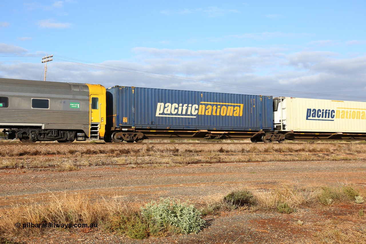 160525 4441
Parkeston, 3PM7 priority service train, RQQY 7077 platform 1 of 5-pack articulated skel waggon set, 1 of 17 built by Qld Rail at Ipswich Workshops in 1995, 48' Pacific National box PNXL 4320.
Keywords: RQQY-type;RQQY7077;Qld-Rail-Ipswich-WS;