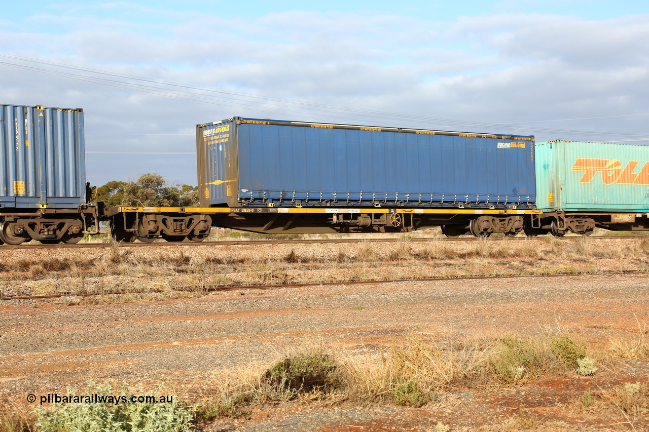 160525 4507
Parkeston, 3PM7 priority service train, RQAY 21859 container waggon, one of a hundred waggons built in 1981 by EPT NSW as type NQAY, recoded to RQAY in 1994. Pacific National 48' curtainsider PNXC 5647.
Keywords: RQAY-type;RQAY21859;EPT-NSW;NQAY-type;