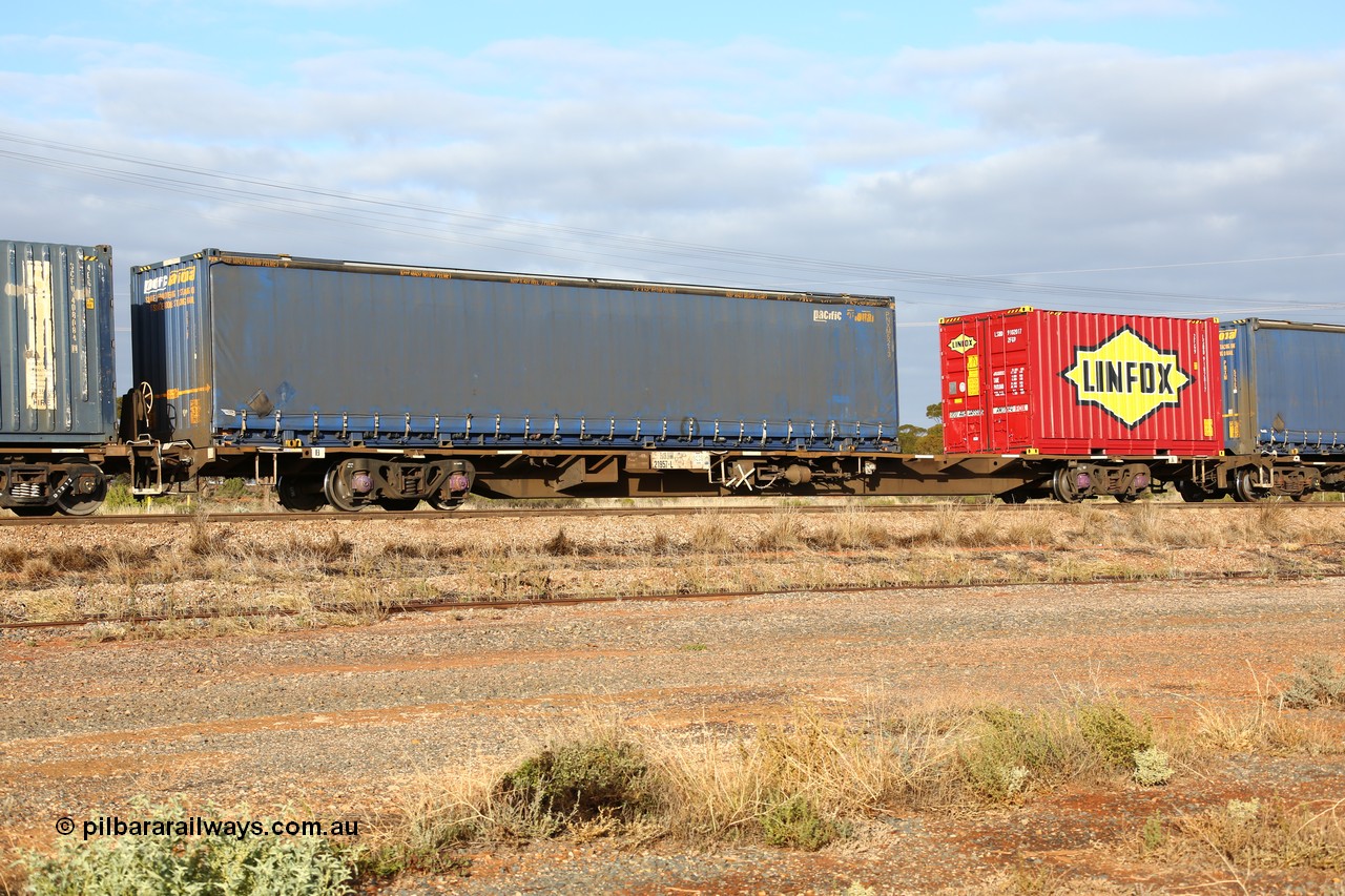 160525 4525
Parkeston, 3PM7 priority service train, RQJW 21957 container waggon, one of twenty five built by Mittagong Engineering NSW as NQJW type in 1980-81, 48' Pacific National curtainsider PNXM 5213 and 20' Linfox LSBD 910201 box.
Keywords: RQJW-type;RQJW21957;Mittagong-Engineering-NSW;NQJW-type;
