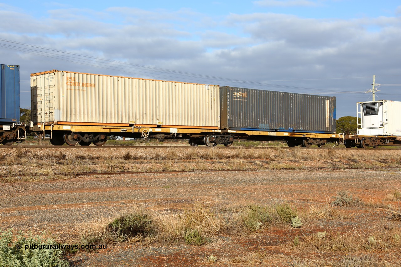 160525 4531
Parkeston, 3PM7 priority service train, RQEY 1962 2-pack container waggon, originally built by Comeng Qld as one of forty LEX type louvre waggons in 1966-67, to ALEX, converted to AQEY, with two 40' boxes, Rail Containers sea2rail SCFU 410189 and Austrans sea2rail SCFU 408263.
Keywords: RQEY-type;RQEY1962;Comeng-Qld;LEX-type;ALEX-type;AQEY-type