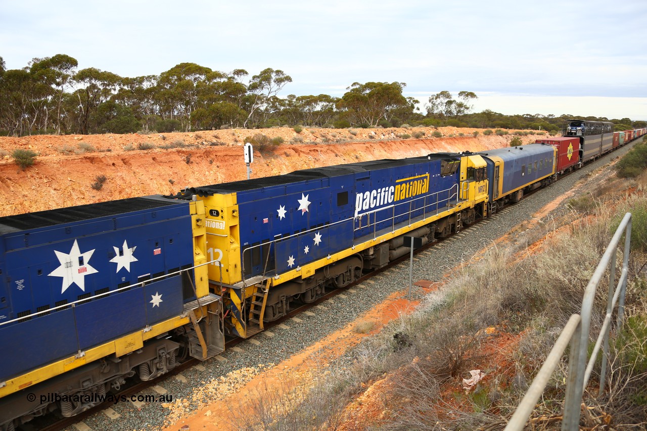 160526 5202
West Kalgoorlie, Melbourne bound intermodal train 4PM6 Goninan built GE model Cv40-9i NR class unit NR 12 serial 7250-02/97-214.
Keywords: NR-class;NR12;Goninan;GE;Cv40-9i;7250-02/97-214;