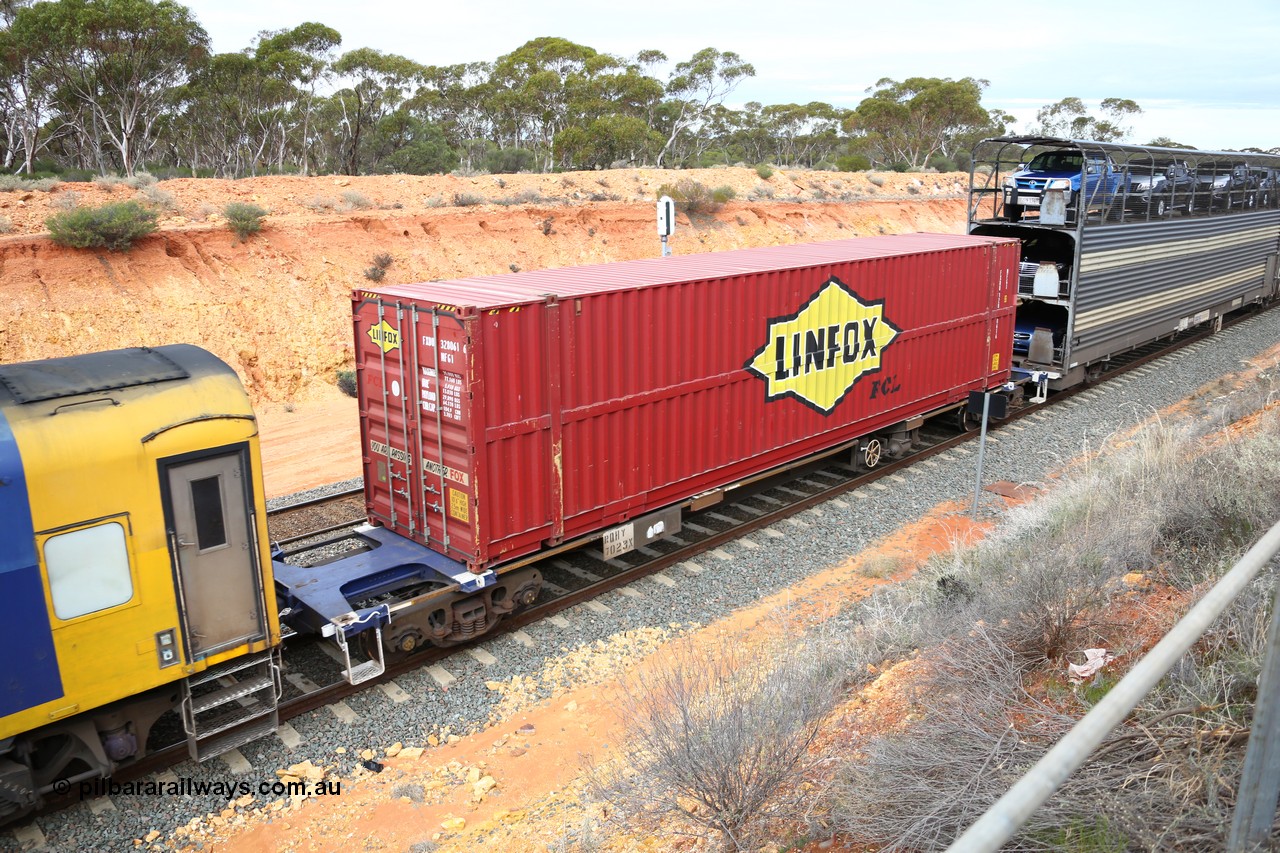 160526 5204
West Kalgoorlie, 4PM6 intermodal train, RQHY 7023 container waggon, one of seventy eight built by Qiqihar Rollingstock Works China in 2005, Linfox - FCL 48' box FXDU 328061.
Keywords: RQHY-type;RQHY7023;Qiqihar-Rollingstock-Works-China;