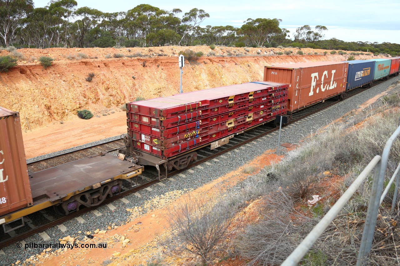 160526 5208
West Kalgoorlie, 4PM6 intermodal train, RRGY 7132 platform 5-pack articulated skel waggon, one of fifty originally built by AN Rail Islington Workshops in 1996-97 as class RRBY, later rebuilt with 48' intermediate decks and coded RRGY, 40' deck, with 40' Linfox flatracks, an FCL 48' high cube, PN and Toll 48' boxes and an 40' box on the end.
Keywords: RRGY-type;RRGY7132;AN-Islington-WS;RRBY-type;