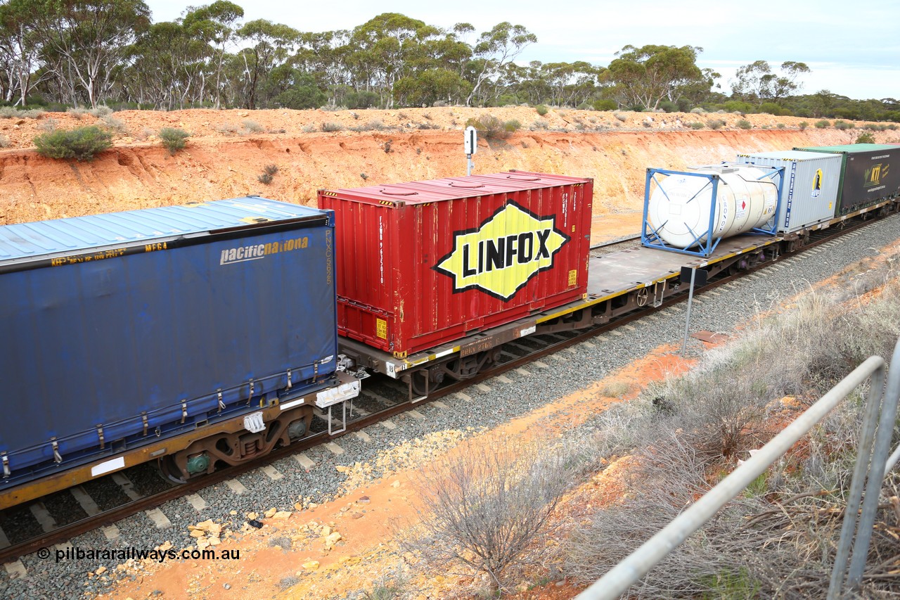 160526 5210
West Kalgoorlie, 4PM6 intermodal train, RRKY 2766 container waggon, one of fifty five built by Perry Engineering SA in 1974 as class RMX, recoded to AQMX, AQSY, RQKY, 20' Linfox FSWB 963501 top loading container and a Cronos 20' tanktainer CRXU 861086.
Keywords: RRKY-type;RRKY2766;Perry-Engineering-SA;RMX-type;AQMX-type;AQSY-type;RQKY-type;