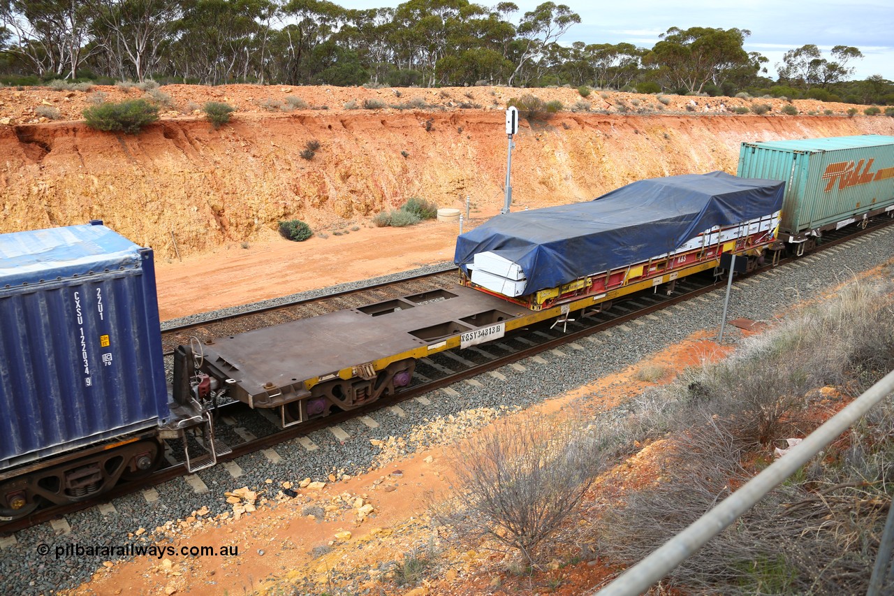 160526 5213
West Kalgoorlie, 4PM6 intermodal train, NQSY 34313 container waggon, one of a batch of one hundred built by Goninan NSW in 1974-75 as OCY class, recoded to NQOY, K+S 40' flatrack KHS 400631 loaded with timber products.
Keywords: NQSY-type;NQSY34313;Goninan-NSW;OCY-type;NQOY-type;