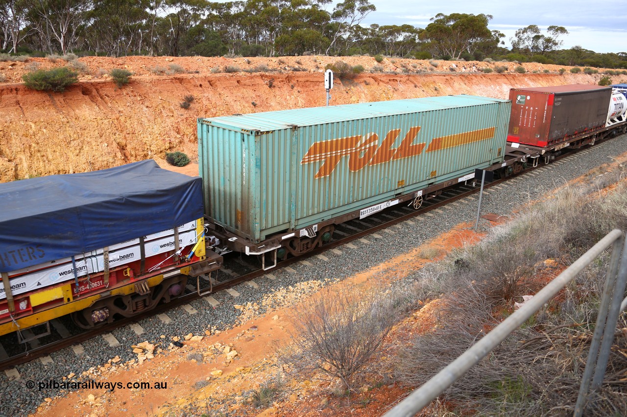 160526 5214
West Kalgoorlie, 4PM6 intermodal train, RQSY 35040 container waggon, one of a batch of one hundred built by Goninan NSW in 1975 as OCY class, recoded to NQOY, then NQSY, 48' Toll box TCML 48419.
Keywords: RQSY-type;RQSY35040;Goninan-NSW;OCY-type;NQOY-type;NQSY-type;