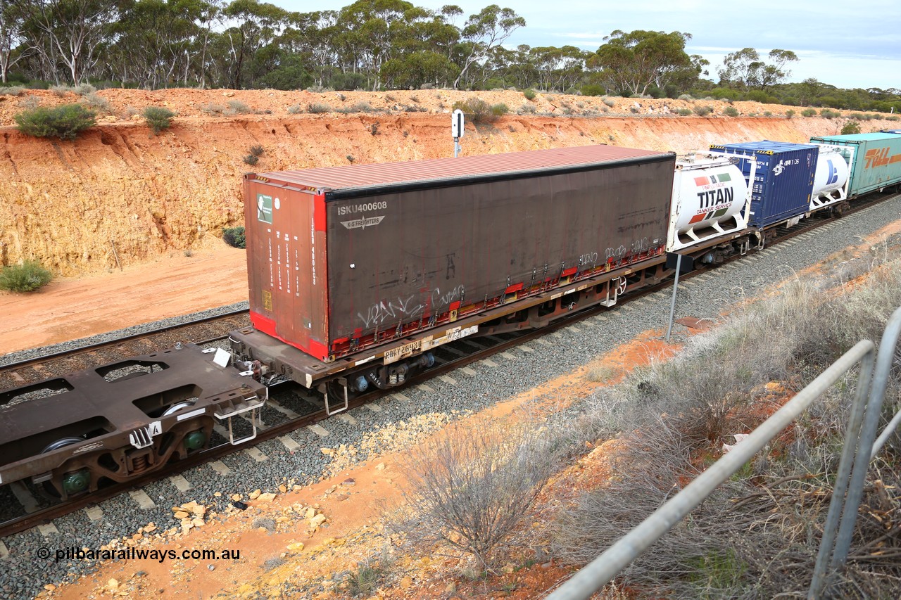 160526 5215
West Kalgoorlie, 4PM6 intermodal train, RQKY 2693 container waggon, built by Perry Engineering SA in 1974 in a batch of seventy four coded RM class, fitted with aligned bogies and recoded to AQMP, with a 40' K+S Freighters curtainsider ISKU 400608 and a 20' Titan tanktainer.
Keywords: RQKY-type;RQKY2693;Perry-Engineering-SA;RM-type;AQMP-type;