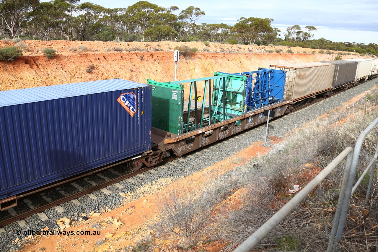 160526 5220
West Kalgoorlie, 4PM6 intermodal train, RQLY 1009 centre well of articulated 5-pack centre well waggon set, one of fourteen sets built by AN Rail Islington Workshops SA in 1991, loaded with former Pilkington Glass 20' plate glass carriers now MXA 17 and AMX 40.
Keywords: RQLY-type;RQLY1009;AN-Islington-WS;AQLY-type;