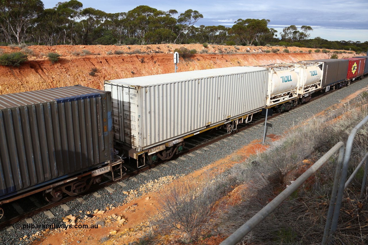 160526 5221
West Kalgoorlie, 4PM6 intermodal train, RQFY 64 container waggon, built by Victorian Railways Bendigo Workshops in 1980 as a batch of seventy five VQFX type skeletal container waggons, then RQFF, then 2CM bogies fitted in 1995, plain 40' SCFU 411245 and 20' Jamieson built tanktainer Toll.
Keywords: RQFY-type;RQFY64;Victorian-Railways-Bendigo-WS;VQFX-type;RQFF-type;