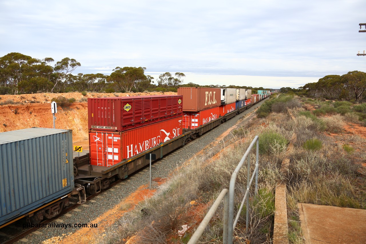 160526 5225
West Kalgoorlie, 4PM6 intermodal train, RRXY 6 view along the double stacked portion of the train.
Keywords: RRXY-type;RRXY6;Worley-Williams;Bradken-Rail-Qld;