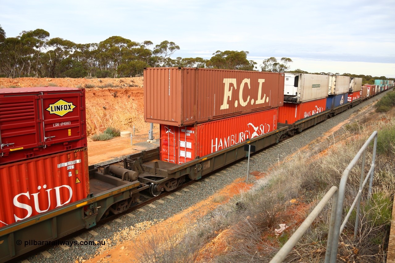 160526 5227
West Kalgoorlie, 4PM6 intermodal train, RRXY 6 platform 4 of 5-pack well waggon set, one of eleven built by Bradken Qld in 2002 for Toll from a Worley-Williams design with a 40' Hamburg Sud box SUDU 882683 in the well and a 48' FCL box FBGU 480236 on top.
Keywords: RRXY-type;RRXY6;Worley-Williams;Bradken-Rail-Qld;