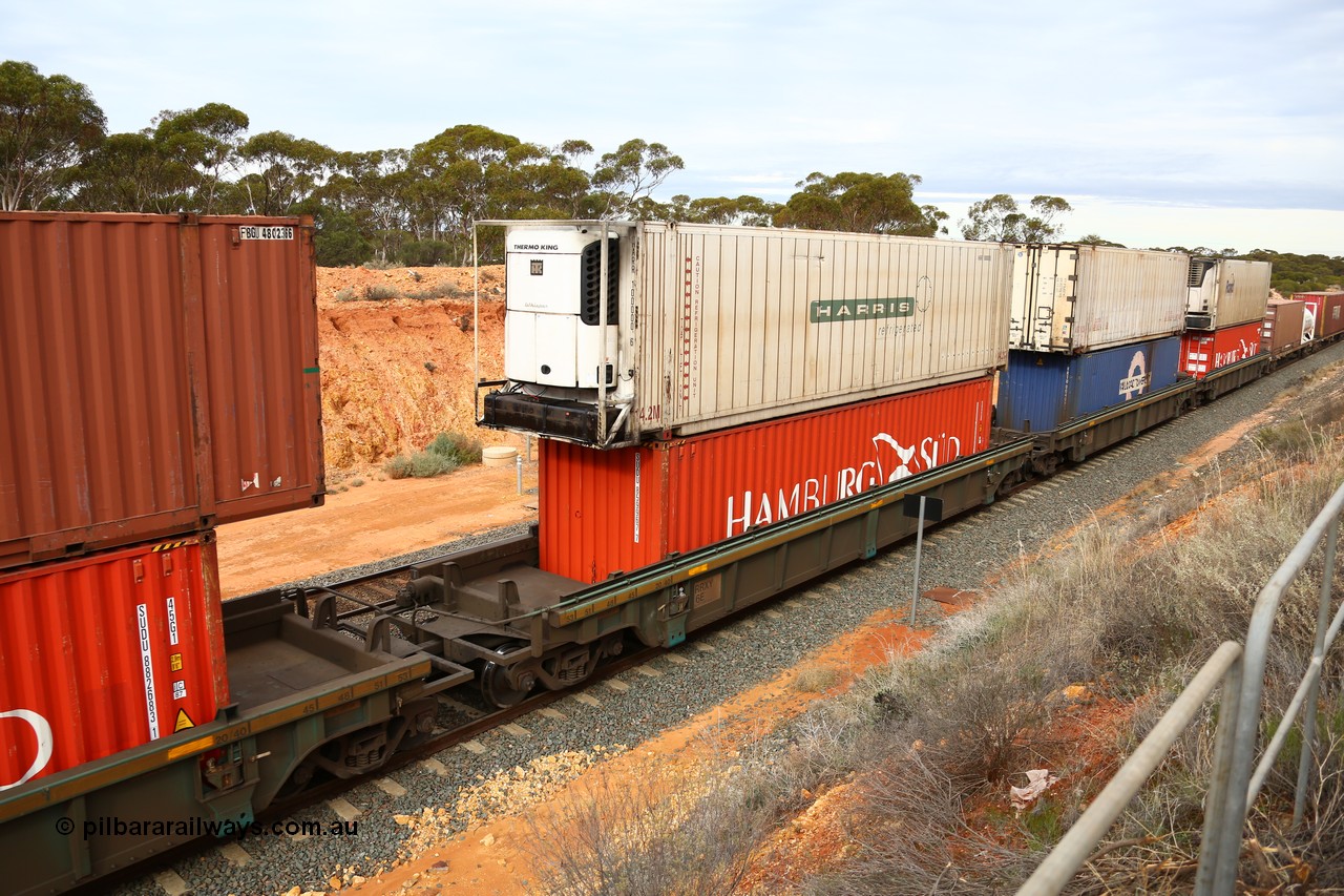 160526 5228
West Kalgoorlie, 4PM6 intermodal train, RRXY 6 platform 3 of 5-pack well waggon set, one of eleven built by Bradken Qld in 2002 for Toll from a Worley-Williams design with a 40' Hamburg Sud box SUDU 859967 in the well and a Harris Refrigerated 46' reefer HARR 100000 on top.
Keywords: RRXY-type;RRXY6;Worley-Williams;Bradken-Rail-Qld;