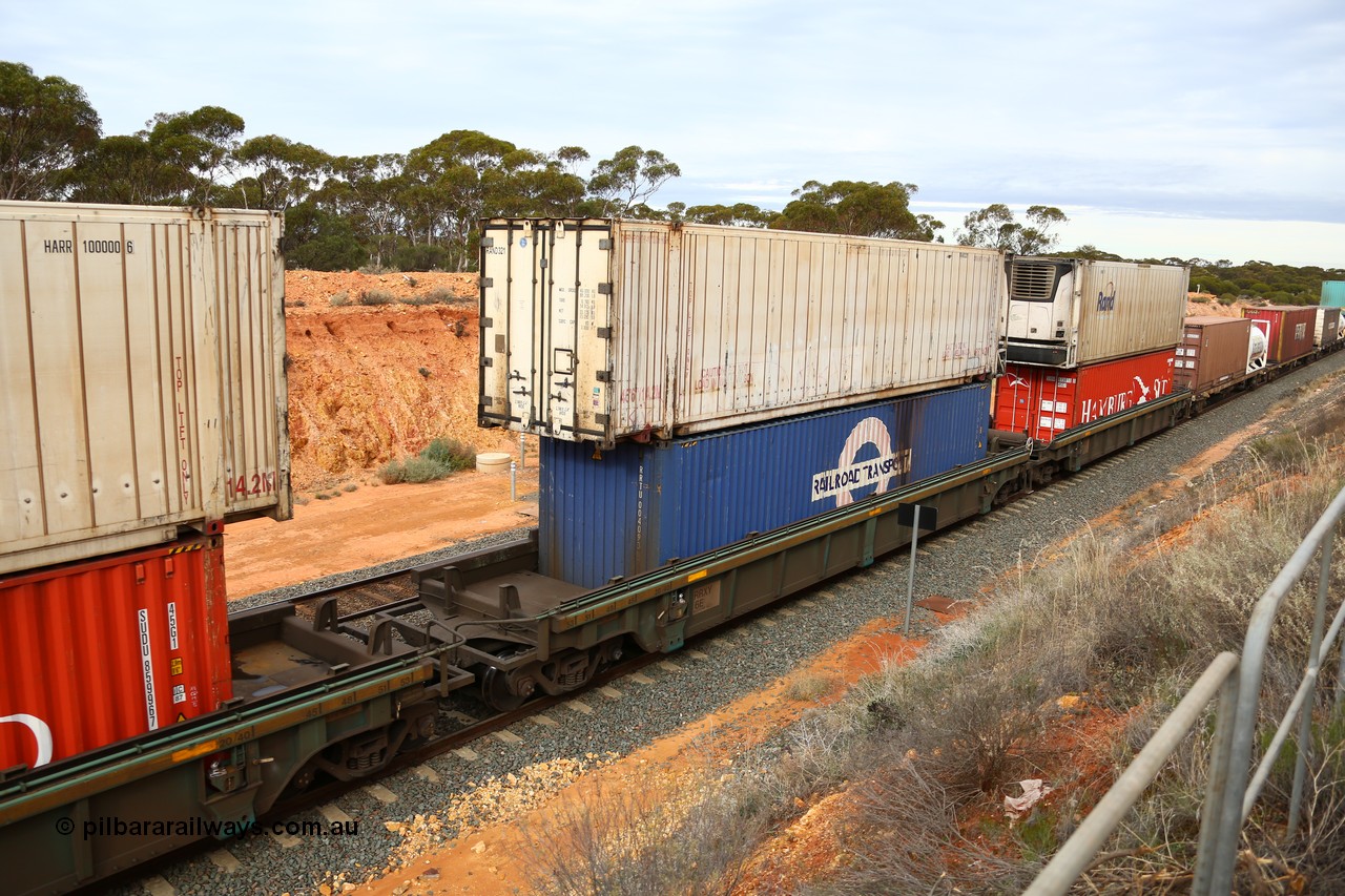 160526 5229
West Kalgoorlie, 4PM6 intermodal train, RRXY 6 platform 2 of 5-pack well waggon set, one of eleven built by Bradken Qld in 2002 for Toll from a Williams-Worley design with a Railroad Transport 40' box RRTU 004093 in the well with an unmarked RAND 46' reefer RAND 321 on top.
Keywords: RRXY-type;RRXY6;Williams-Worley;Bradken-Rail-Qld;