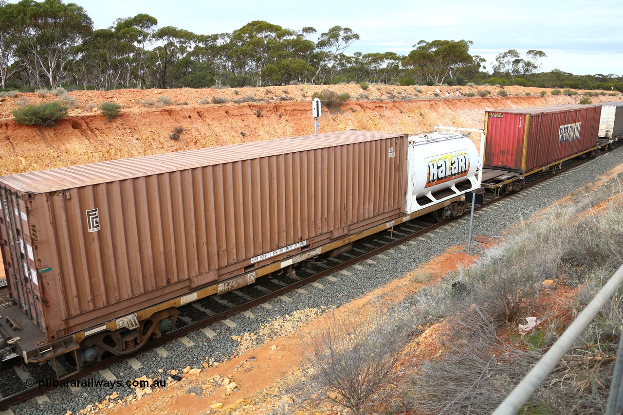 160526 5231
West Kalgoorlie, 4PM6 intermodal train, RQGY 34321 container waggon, one of a batch of one hundred built by Goninan NSW in 1974-75 as OCY class, recoded to NQOY, then NQSY, 40' FCL container FCGU 964359 and a Jamieson built 20' tanktainer for Kalari K 8124.
Keywords: RQGY-type;RQGY34321;Goninan-NSW;OCY-type;NQOY-type;NQSY-type;