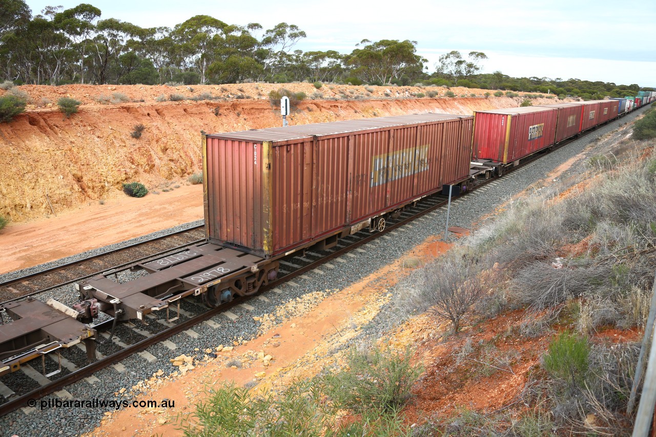 160526 5238
West Kalgoorlie, 4PM6 intermodal train, RQJW 21978 80' container waggon, one of twenty five built by Mittagong Engineering NSW as JCW type in 1980, 53' Patrick automobile container C 024.
Keywords: RQJW-type;RQJW21978;Mittagong-Engineering-NSW;JCW-type;NQJW-type;