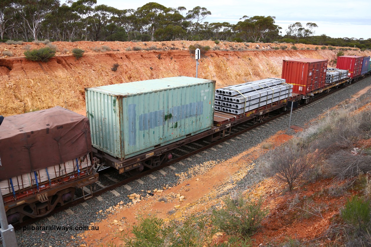 160526 5249
West Kalgoorlie, 4PM6 intermodal train, RQCY 865 container waggon one of a hundred built by Victorian Railways Bendigo Workshops in 1977 as FQX class, recoded to VQCX, in 1994 to RQCX. 20' plain box CCLU 310893 and a 40' KT class flatrack KT 596 with concrete panels.
Keywords: RQCY-type;RQCY865;Victorian-Railways-Bendigo-WS;FQX-type;VQCX-type;