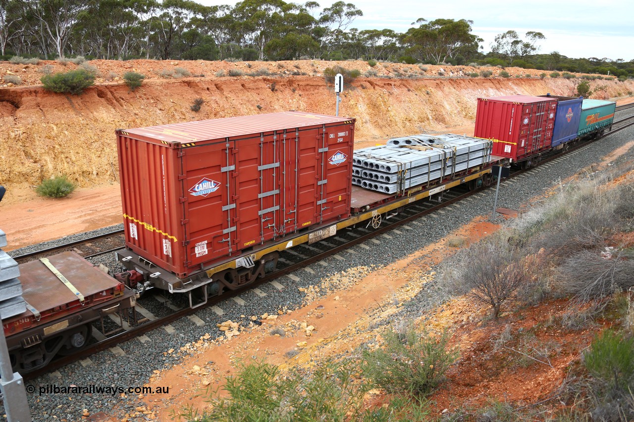 160526 5250
West Kalgoorlie, 4PM6 intermodal train, RQSY 34328 container waggon, one of one hundred built by Goninan NSW as OCY class in 1974-75, recoded to NQOY then NQSY, with a 20' Cahill side door CHLL 200003 and a 40' KT 400### series flatrack with concrete panels.
Keywords: RQSY-type;RQSY34328;Goninan-NSW;OCY-type;NQOY-type;NQSY-type;