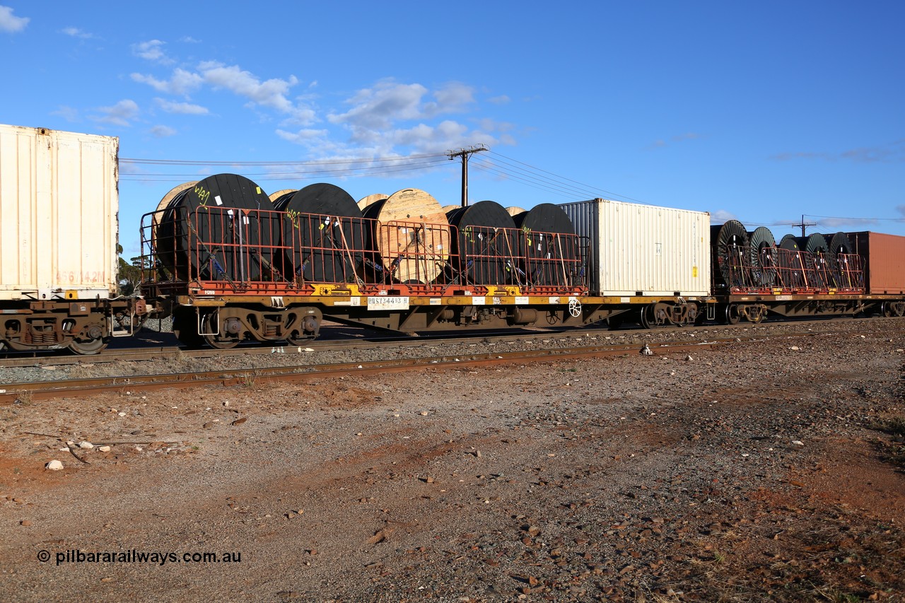 160528 8356
Parkeston, 5SP5 intermodal train, RQSY 34493 container waggon, part of one hundred built by Tulloch NSW in 1974/75 as OCY type. Loaded with a 40' flat rack FD66 with cable drums and 20' Royal Wolf 25G1 type container RWLU 739016.
Keywords: RQSY-type;RQSY34493;Tulloch-Ltd-NSW;OCY-type;