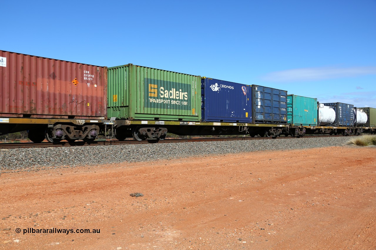 160528 8399
Binduli, intermodal train 6PM6, RRTY 696 container waggon, originally a Victorian Railways built FQX type, then recoded to VQCX type. Three 20' boxes, Sadleirs RCSB 5088, Cronos TINT 124807 and SCF side door SPDU 302253.
Keywords: RRTY-type;RRTY696;Victorian-Railways-Newport-WS;FQX-type;VQCX-type;