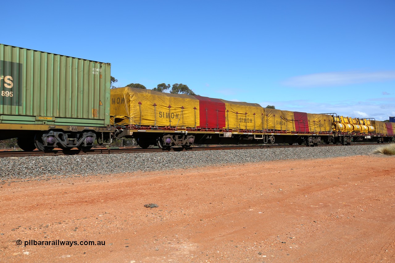 160528 8402
Binduli, intermodal train 6PM6, RQPW 60053 80' jumbo container waggon with two 40' FD flatracks with tarped Simon loads, FD 192. Originally built by Victorian Railways Bendigo Workshops in 1984 as part of fifty VQDW type jumbo container waggons. In the late 80's leased to NSW and recoded to NQMW and renumbered to current number. To National Rail in 1994/95.
Keywords: RQPW-type;RQPW60053;Victorian-Railways-Bendigo-WS;VQDW-type;VQDW30;NQWM-type;