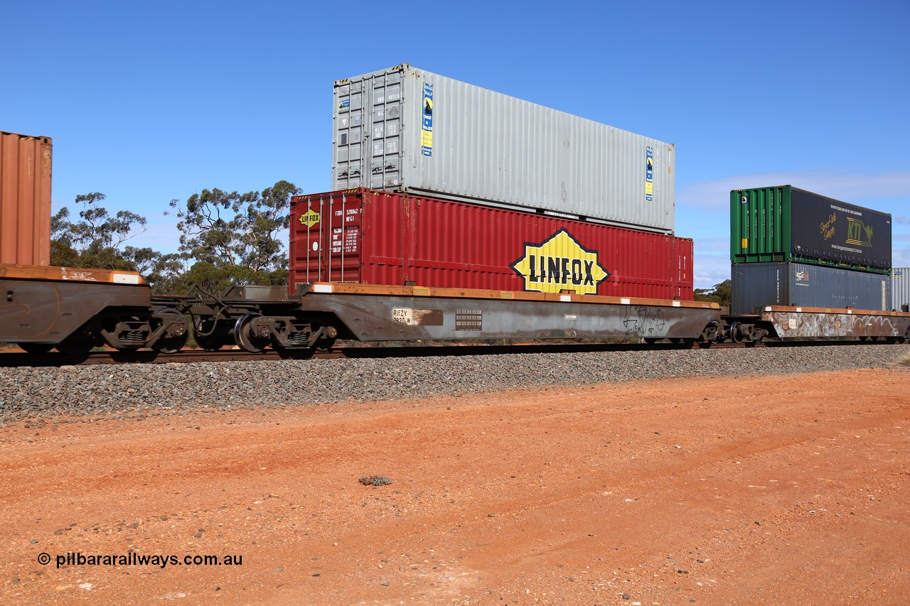 160528 8423
Binduli, intermodal train 6PM6, RRZY type five unit bar coupled well container waggon set RRZY 7030 platform 2, originally built by Goninan in a batch of twenty six RQZY type for National Rail, recoded when repaired. 48' MFG1 type Linfox container FXDU 328062 double stacked with a Royal Wolf 4EG1 type 40' container RWTU 941116.
Keywords: RRZY-type;RRZY7030;Goninan-NSW;RQZY-type;