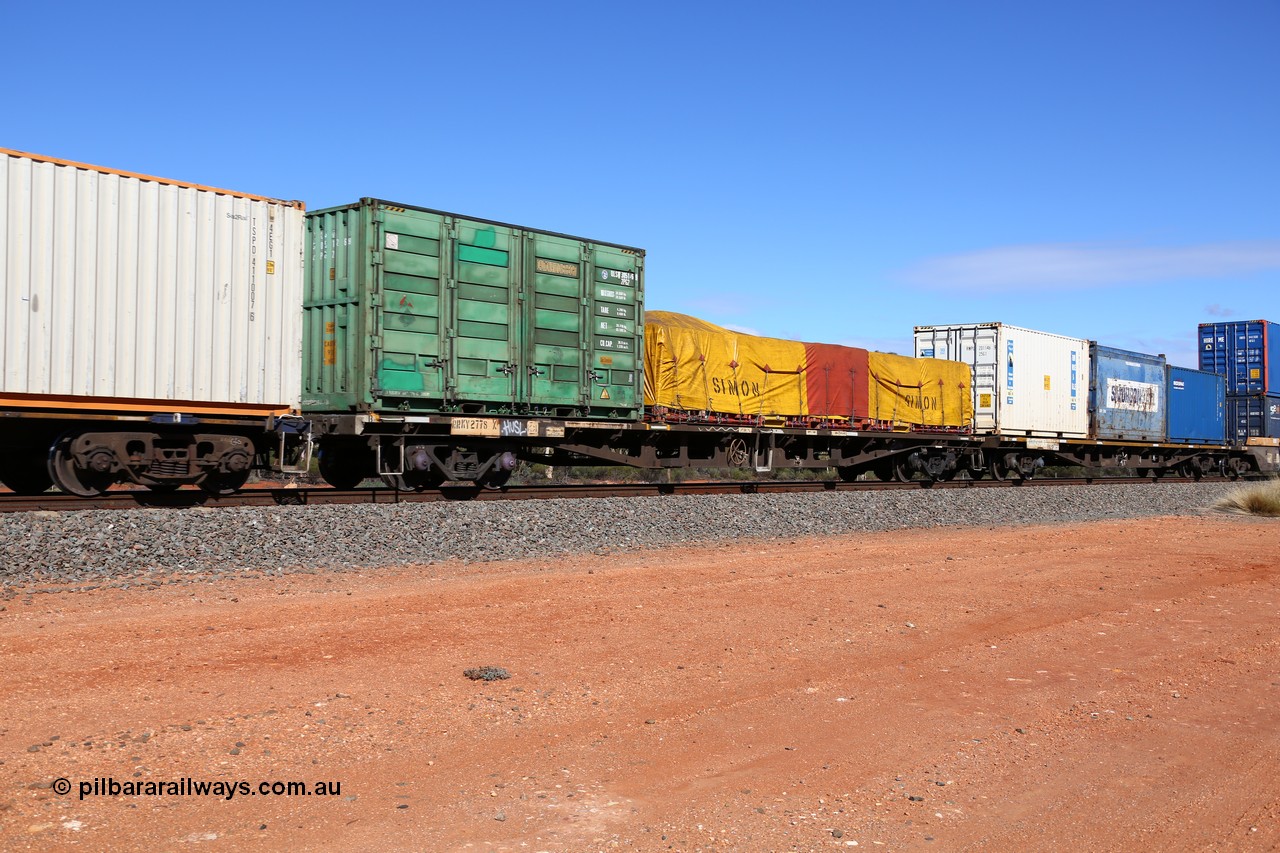 160528 8426
Binduli, intermodal train 6PM6, RRKY type container waggon RRKY 2778 originally built by Perry Engineering SA in 1974 as RMX type in a batch of fifty five waggons. Recoded to AQMX then AQSY in 1988, then to RQKY in 1994. loaded with a 20' 2PG2 type side door container QLSU 305126 and a 40' flat rack with Simon tarps.
Keywords: RRKY-type;RRKY2778;Perry-Engineering-SA;RMX-type;AQMX-type;AQSY-type;RQKY-type;