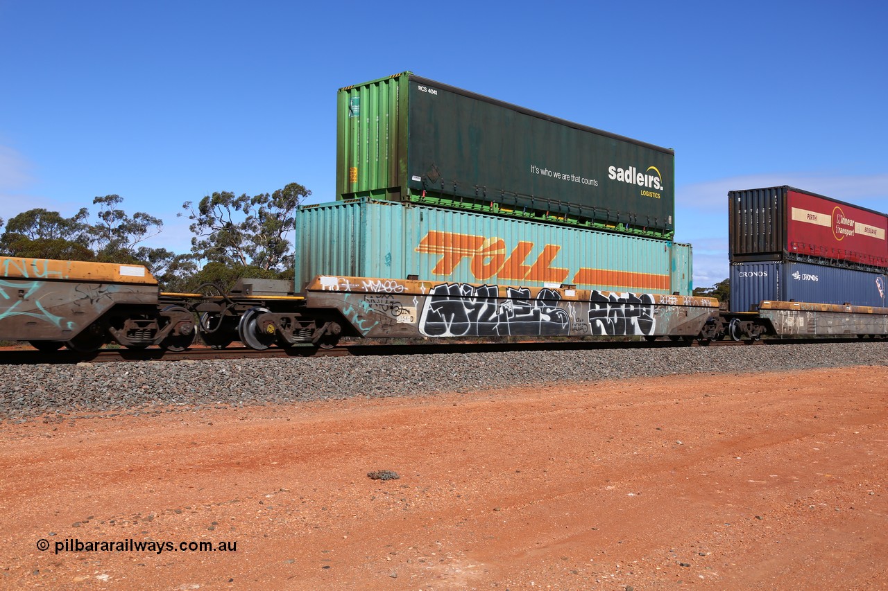 160528 8429
Binduli, intermodal train 6PM6, RQZY 7054 platform 2 of five unit bar coupled well container waggon set built in a batch of thirty two by Goninan NSW in 1995/96, loaded with a Toll 48' MFG1 type container TDDS 486144 double stacked with a Sadleirs 40' curtain sider container RCS 4041.
Keywords: RQZY-type;RQZY7054;Goninan-NSW;