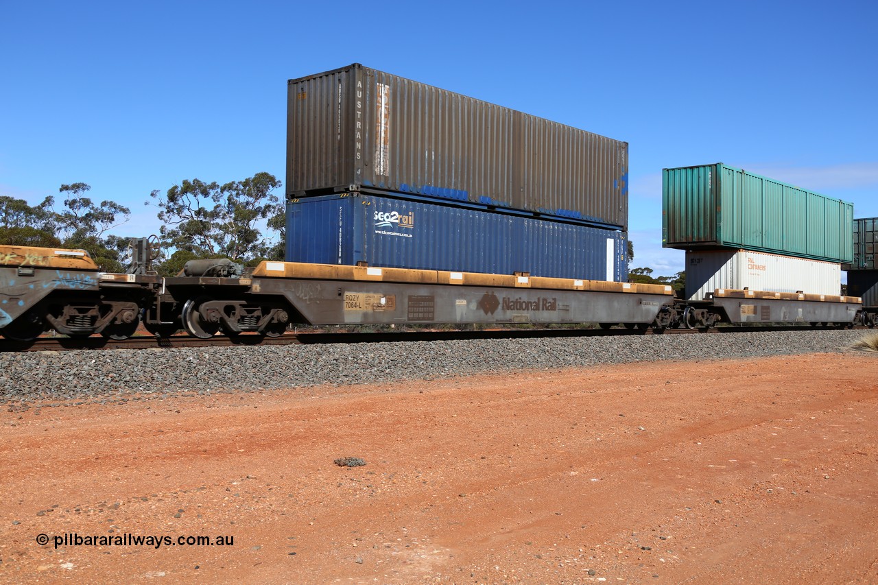 160528 8433
Binduli, intermodal train 6PM6, RQZY 7064 platform 1 of five unit bar coupled well container waggon set built in a batch of thirty two by Goninan NSW in 1995/96,  loaded with a Sea2Rail 40' 4EG1 type container SCFU 408288 [4] double stacked with Austrans 40' 4EG1 type container AUSU 405030 [0].
Keywords: RQZY-type;RQZY7064;Goninan-NSW;