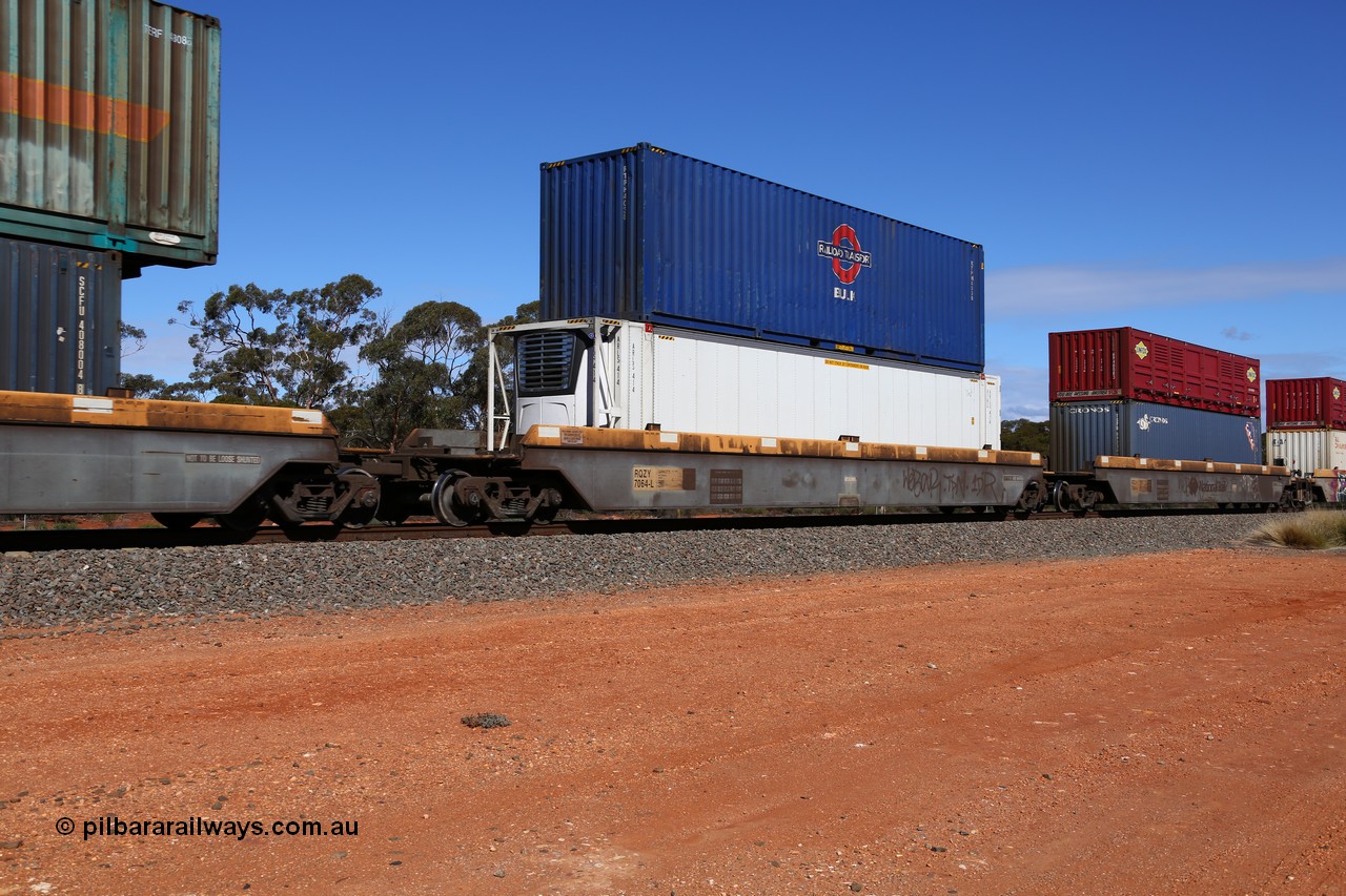 160528 8436
Binduli, intermodal train 6PM6, RQZY 7064 platform 4 of five unit bar coupled well container waggon set built in a batch of thirty two by Goninan NSW in 1995/96, loaded with an ARLS 46' RFRG type reefer ARLS 414 double staked with a 40' Railroad Transport bulk box RTPH 4038.
Keywords: RQZY-type;RQZY7064;Goninan-NSW;