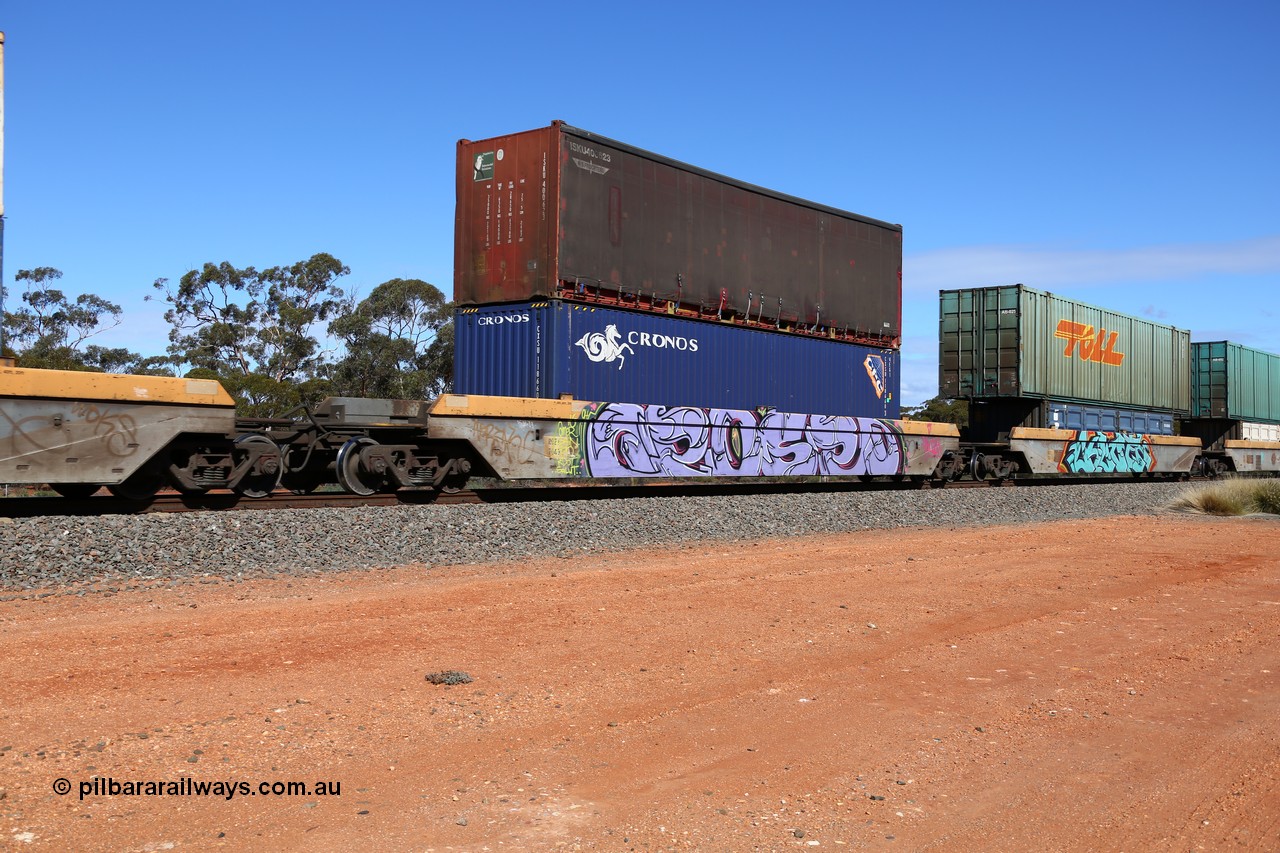 160528 8440
Binduli, intermodal train 6PM6, RQZY 7040 platform 3 of five unit bar coupled well container waggon set built in a batch of thirty two by Goninan NSW in 1995/96, loaded with a Cronos 40' 4EG1 type container CXSU 118660 double stacked with a K&S Freighters 40' curtainsider ISKU 400623.
Keywords: RQZY-type;RQZY7040;Goninan-NSW;