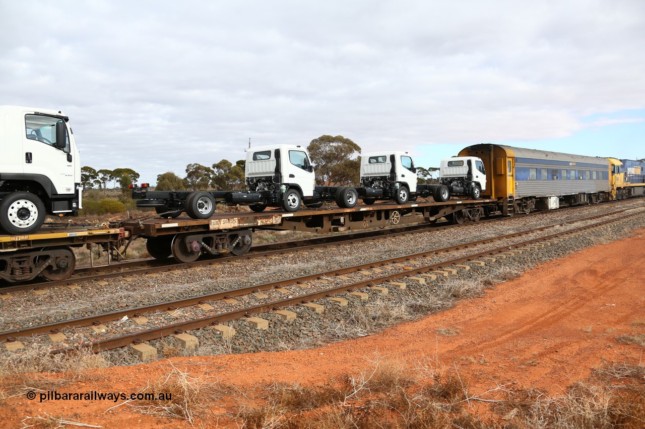 160529 8764
Parkeston, 6MP4 intermodal train, RQKY 3083 container waggon, originally built in a batch of fifty by Carmor Engineering SA as RMX type in 1976, recoded to AQMX, then AQSY. Loaded with three small Isuzu cab-chassis trucks.
Keywords: RQKY-type;RQKY3083;Carmor-Engineering-SA;RMX-type;AQMX-type;AQSY-type;