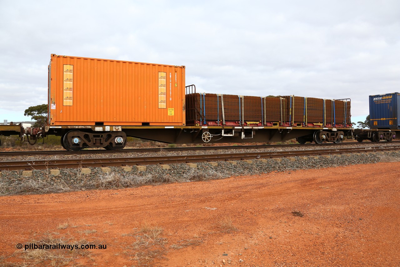 160529 8797
Parkeston, 6MP4 intermodal train, RQFY 73 container waggon, built by Victorian Railways Bendigo Workshops in 1980 as a batch of seventy five VQFX type skeletal container waggons, recoded to VQFY c1985, then RQFF May 1994, then 2CM bogies fitted in Aug 1995 and current code Jan 1996, loaded with an Allied Pickfords 20' 25G1 type box RWTU 966291 and a K+S 40' flat rack KT 131 loaded with reo mesh.
Keywords: RQFY-type;RQFY73;Victorian-Railways-Bendigo-WS;VQFX-type;
