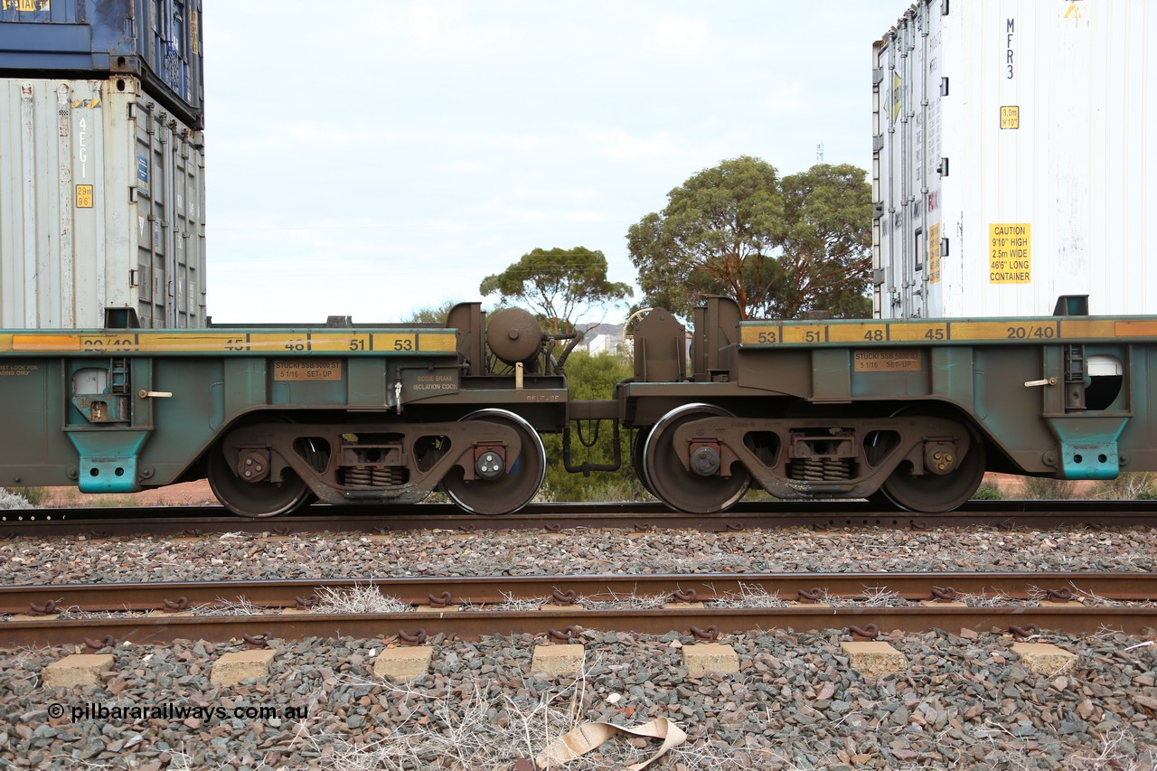 160529 8806
Parkeston, 6MP4 intermodal train, RRXY 8 shows the bar coupling and pipes between platform 4 and 5 of 5-pack well waggon set, one of eleven built by Bradken Qld in 2002 for Toll from a Williams-Worley design.
Keywords: RRXY-type;RRXY8;Williams-Worley;Bradken-Rail-Qld;