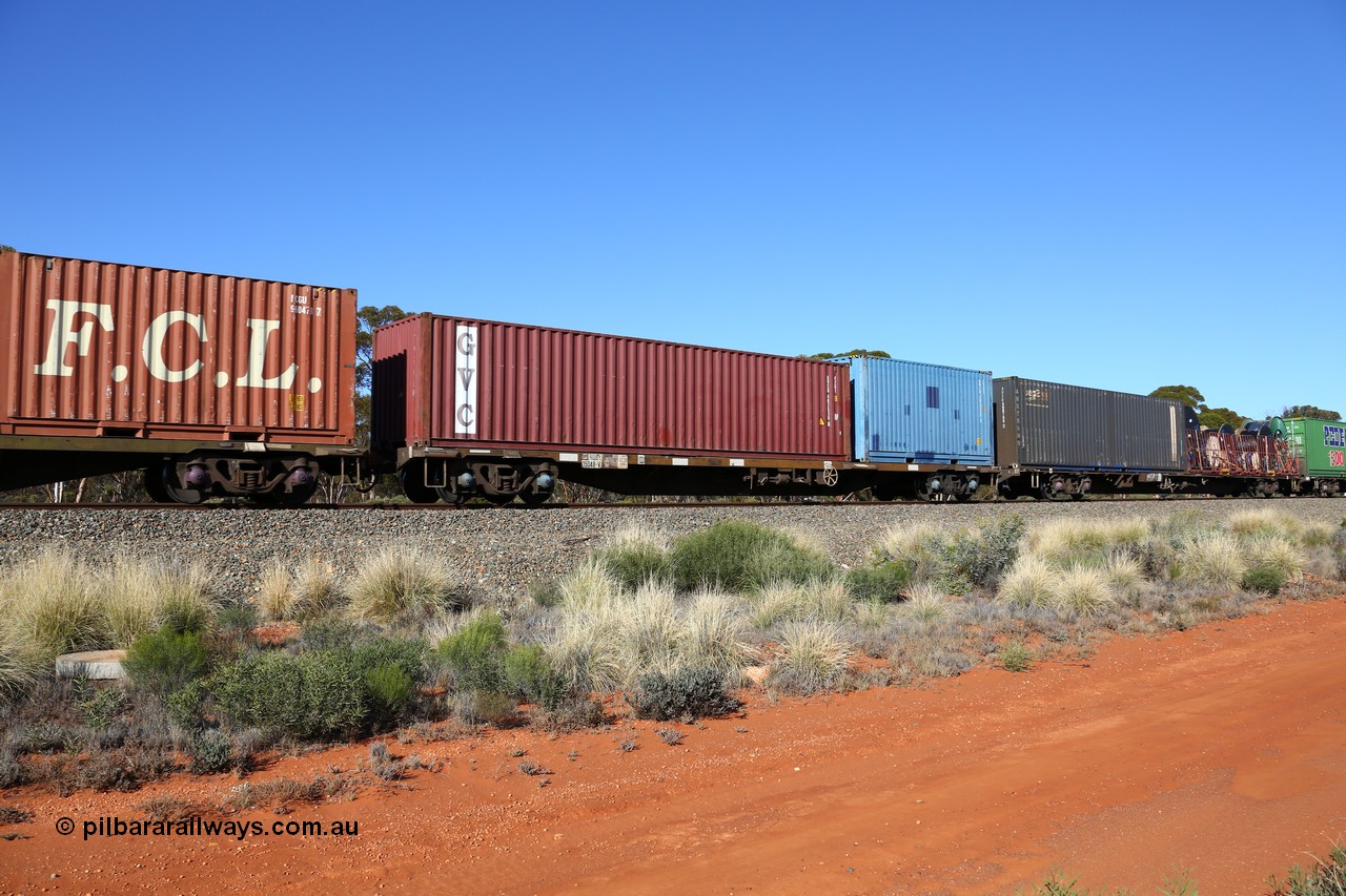 160530 9253
Binduli, 7SP3 intermodal service, container waggon RQBY 15048, one of seventy that Comeng NSW built as OCY type in 1974-75, recoded to NQOY, then NQSY and NQBY. Loaded with a 20' ADLU 203750 and an GVC 40' GVCU 402538 container.
Keywords: RQBY-type;RQBY15048;Comeng-NSW;OCY-type;NQOY-type;NQSY-type;NQBY-type;