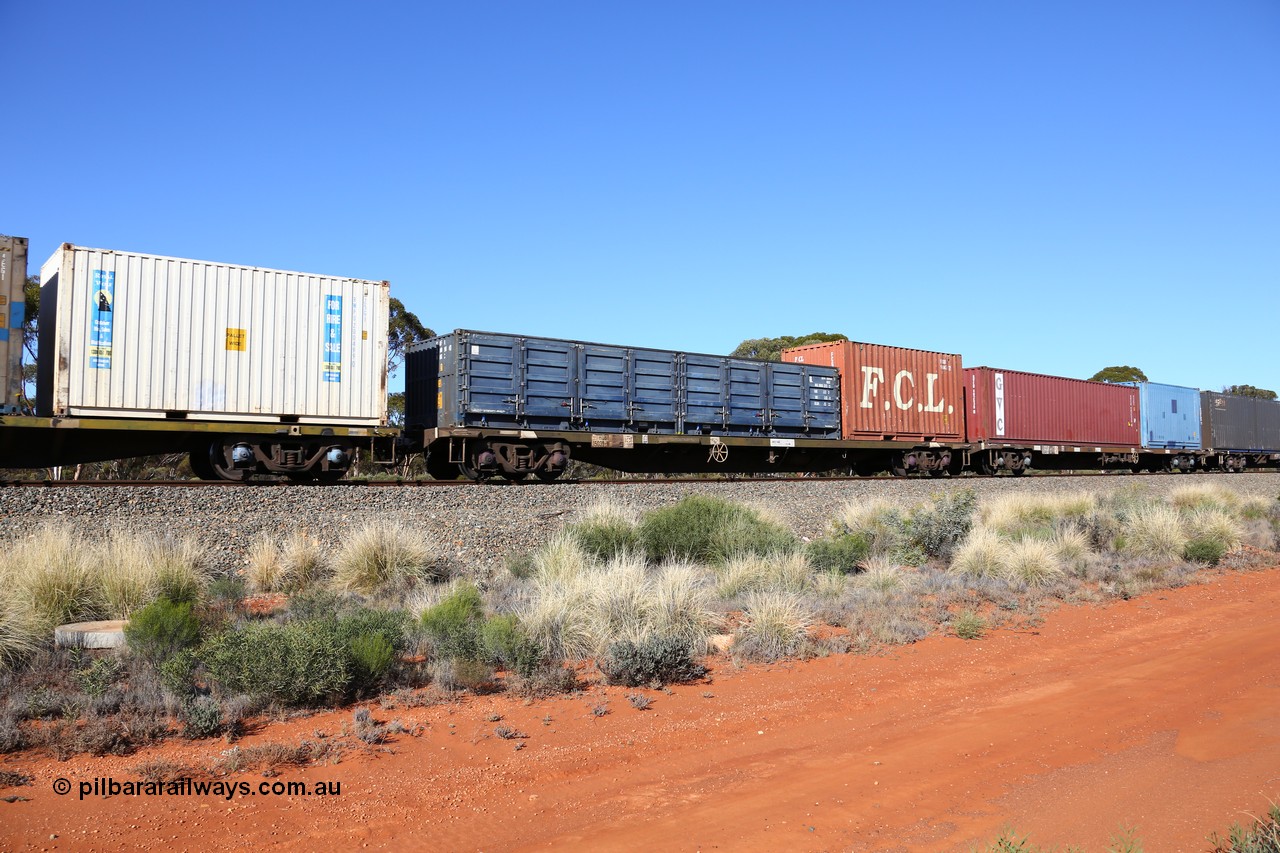 160530 9254
Binduli, 7SP3 intermodal service, container waggon RQBY 15039, one of seventy that Comeng NSW built as OCY type in 1974-75, recoded to NQOY, then NQSY and NQBY. Loaded with a 20' FCGU 960478 and an SCF 40' half height side door container 200564.
Keywords: RQBY-type;RQBY15039;Comeng-NSW;OCY-type;NQOY-type;NQSY-type;NQBY-type;