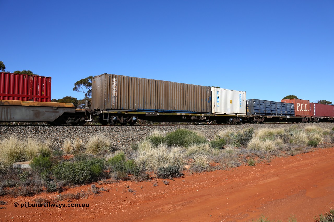 160530 9255
Binduli, 7SP3 intermodal service, container waggon RQAY 21910, one of a hundred such waggons built in 1981 by EPT NSW as type NQAY, recoded to RQAY in 1994. 20' Royal Wolf RWPU 200499 container and 40' SCF Austrans AUSU 470475 container.
Keywords: RQAY-type;RQAY21910;EPT-NSW;NQAY-type;