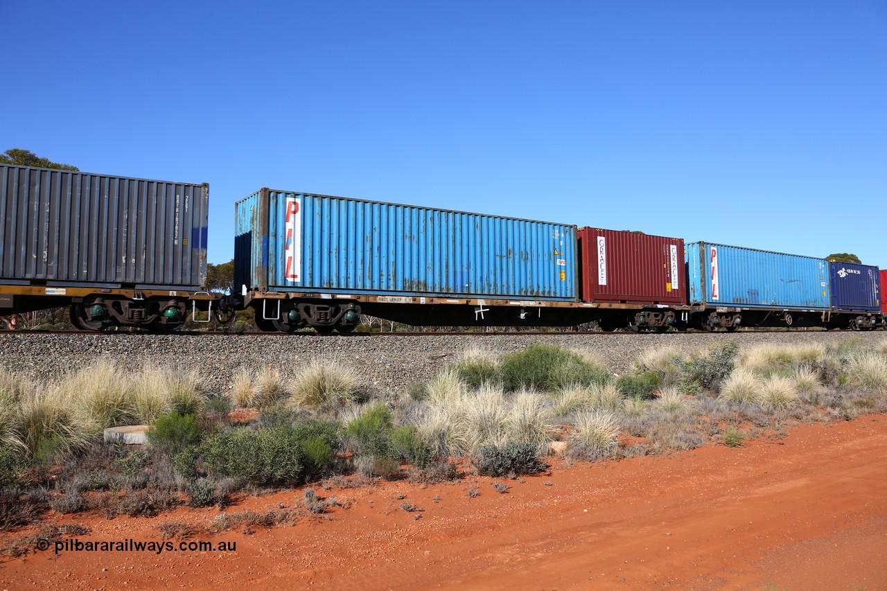 160530 9262
Binduli, 7SP3 intermodal service, RQGY 14912 container waggon orginally built by Comeng NSW in a batch of fifty OCY type container waggons in 1974/75, recoded to NQOY in 1Carrying PIL 45G1 type 40' container PCIU 997605 and a Grace 20' 2EG1 type container GRRU 230520.
Keywords: RQGY-type;RQGY14912;Comeng-NSW;OCY-type;