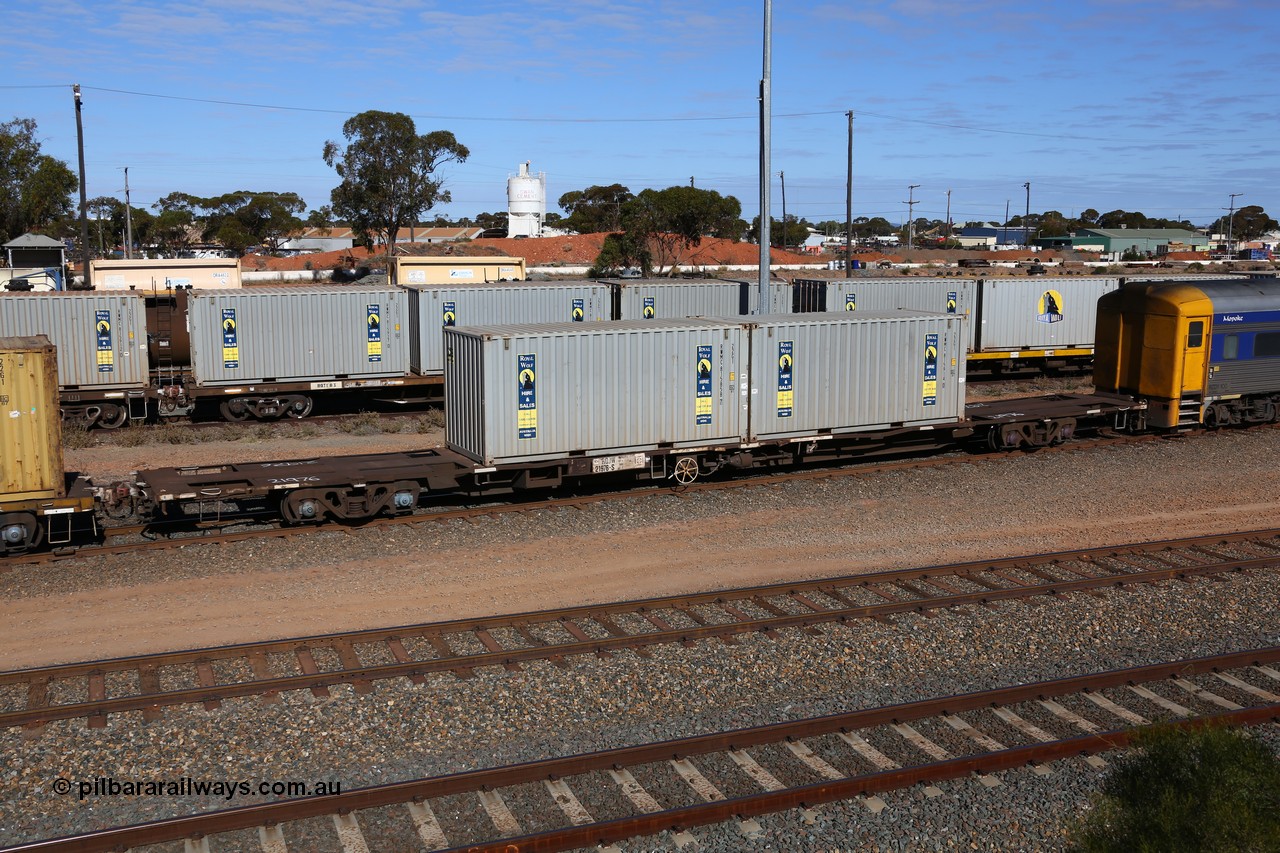 160531 9895
West Kalgoorlie, 1MP2 steel train, RQJW type container waggon RQJW 21976, leader of the third batch of twenty five JCW type 80' container waggons built in 1980 by Mittagong Engineering NSW, recoded to NQJW, then to National Rail in 1994/95. Loaded with two 22G1 type 20' Royal Wolf boxes RWMC 815858 and RWMC 815914.
Keywords: RQJW-type;RQJW21976;Mittagong-Engineering-NSW;JCW-type;NQJW-type;