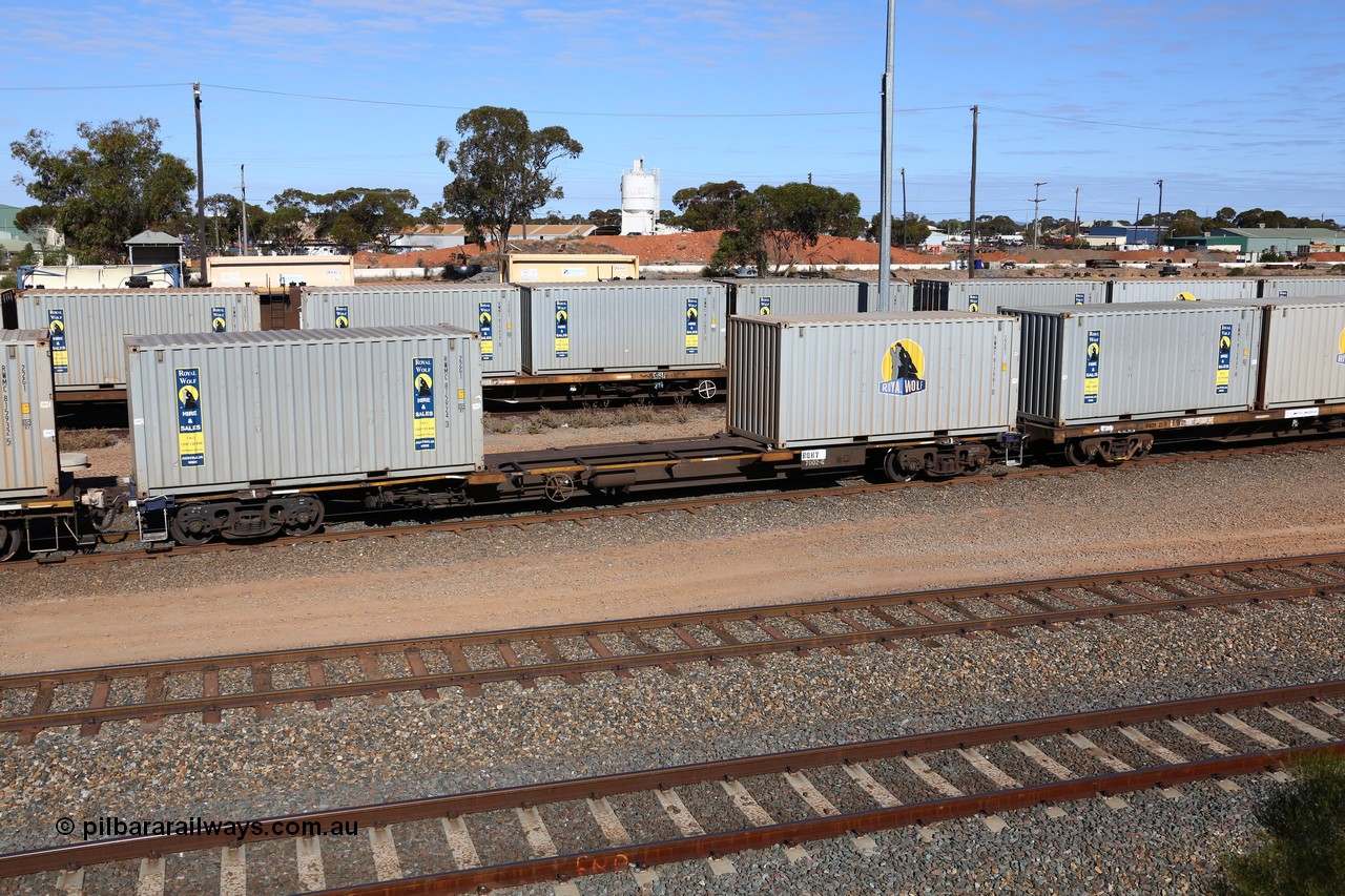160531 9907
West Kalgoorlie, 1MP2 steel train, container waggon RQHY 7002, one of seventy eight built in 2005 by Qiqihar Rollingstock Works in China, with two 20' Royal Wolf containers RWMC 815924 and RWMC 817981.
Keywords: RQHY-type;RQHY7002;Qiqihar-Rollingstock-Works-China;