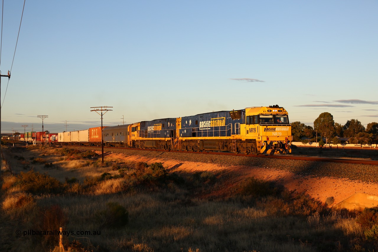 160601 10088
West Kalgoorlie, 2MP5 intermodal service climbs up the grade from Kalgoorlie across Gateacre Road at the 651 km post behind Goninan built GE model Cv40-9i NR class unit NR 19 serial 7250-03/97-221 and a sister unit and 24 waggons for 1464 metres and 3936 tonnes.
Keywords: NR-class;NR19;Goninan;GE;Cv40-9i;7250-03/97-221;