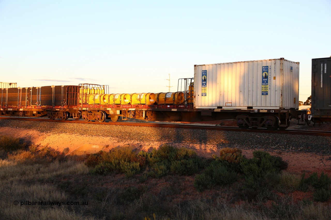 160601 10139
West Kalgoorlie, 2MP5 intermodal train, NQKY 34693 container waggon, originally built by EPT NSW as an open waggon type CDY in a batch of two hundred in 1975/76, recoded to NOCY. 20' Royal Wolf box RWTU 964775 and a KT type 40' flatrack KT 400273 loaded with IOXM chlorine gas cylinders.
Keywords: NQKY-type;NQKY34693;EPT-NSW;CDY-type;NOCY-type;