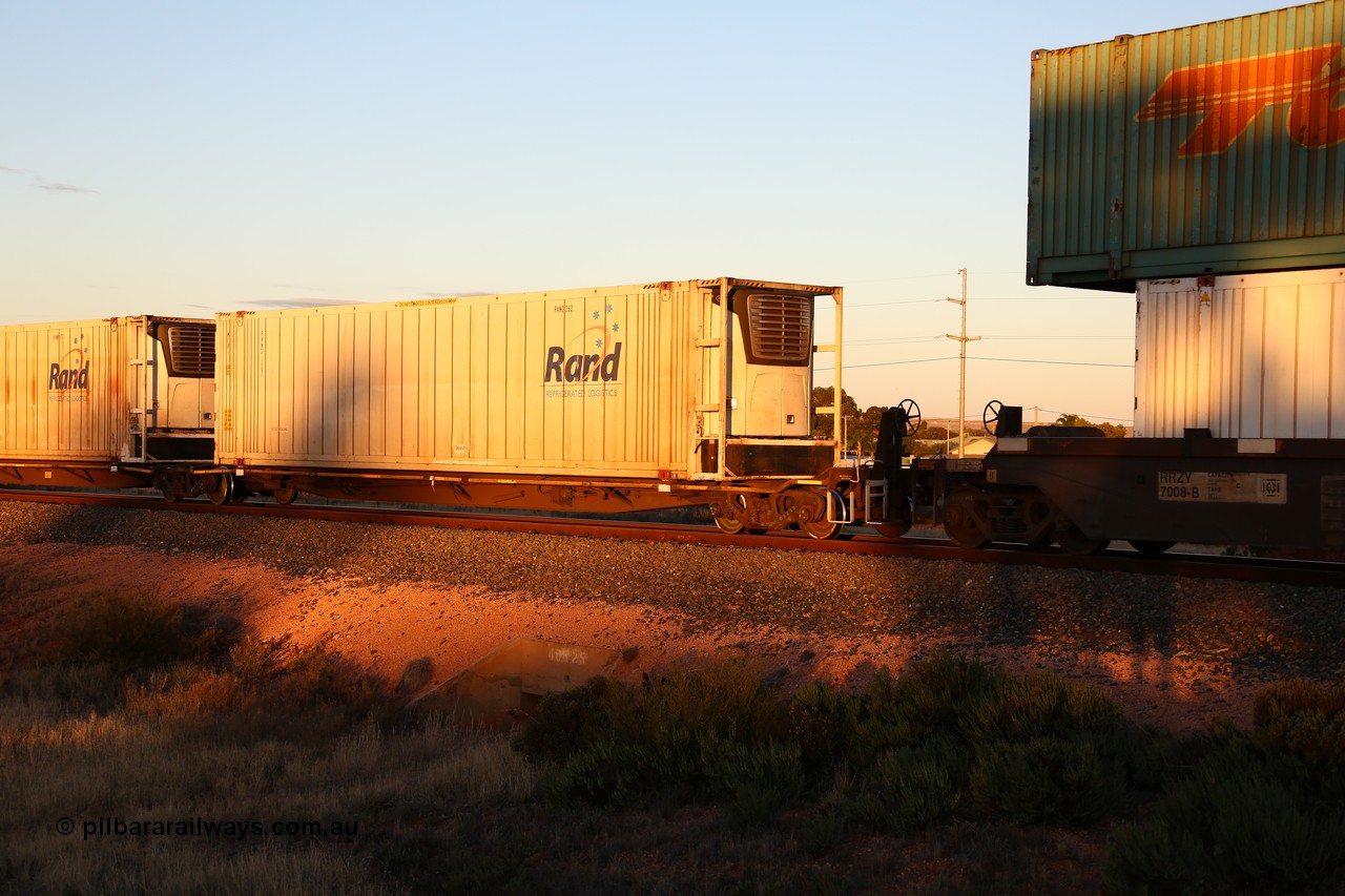 160601 10150
West Kalgoorlie, 2MP5 intermodal train, RRYY 22 platform 5 of 5-pack articulated low profile skel waggon set, one of fifty two such sets built by Bradken Rail Braemar from a Worley-Williams design, based on the TNT TRAY type for moving automotive carrying containers, 46' RAND Refrigerated Logistics reefer RAND 262.
Keywords: RRYY-type;RRYY22;Worley-Williams;Bradken-NSW;